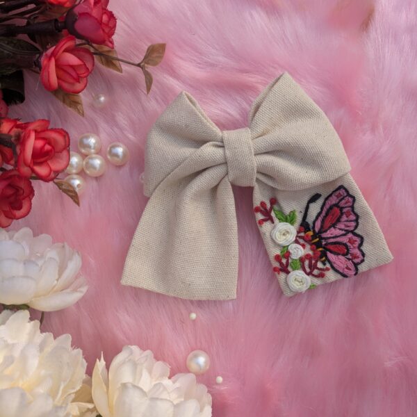 Butterfly in the garden embroidery in hair bow